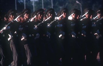 LAOS, Military, Line of soldiers on parade armed with bayonets.