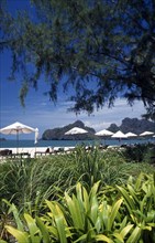 MALAYSIA, Kedah, Langkawi, Pantai Rhu beach from the gardens of the Radisson Resort hotel with