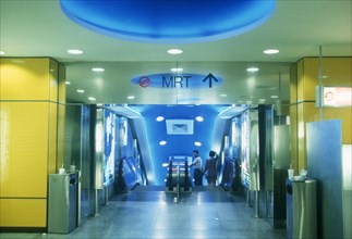 SINGAPORE, Transport, "MRT station interior, looking towards the escalators."
