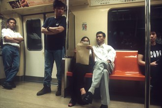 SINGAPORE, Transport, Passengers on board a Mass Rapid Transport or MRT train.