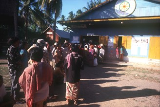 CAMBODIA, Battambang, People lining up to vote at a polling station in Anlong.