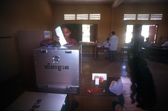 CAMBODIA,  , Politics, Woman voting in a polling station durin elections in rural area along Route