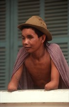 CAMBODIA, Health, War wounded  amputee man at centre for disabled veterans.