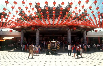 MALAYSIA, Kuala Lumpur, "Thean Hou Temple, entrance with crowds of visitors and strings of coloured