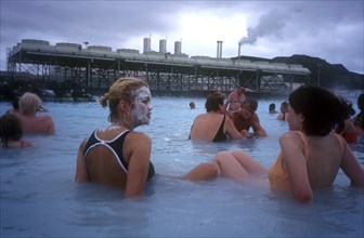 ICELAND, Gullbringu, Reykjanes Peninsula, Bathers in the Svartsengi thermal power station Blue