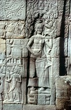 CAMBODIA, Siem Reap, Angkor, "Deatail of wall carving depicting an apsara, or dancing woman."