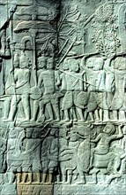 CAMBODIA, Siem Reap, Angkor Wat, Detail of relief wall carving.