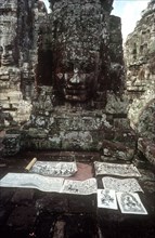 CAMBODIA, Siam Reap, Angkor Wat, The Bayon.  Rubbings of the wall carvings for sale.