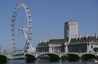 ENGLAND, London, View across the Thames towards the London Eye Millennium Wheel.