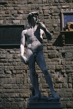 ITALY, Tuscany, Florence, One of the copies of David by Michelangelo in front of the Palazzo