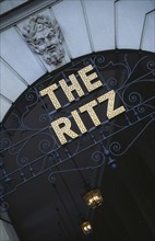 ENGLAND, London, "The Ritz Hotel in Piccadily, detail of archway with name sign."