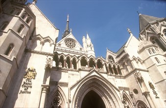 ENGLAND, London, "The Royal Courts of Justice, built in 1882.  Detail of exterior facade with name