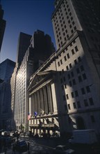 USA, New York, Manhattan, The Stock Exchange building front in a narrow street