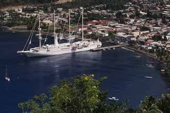 WEST INDIES, St Lucia, Soufriere, View over harbour with Tall Ship moored.