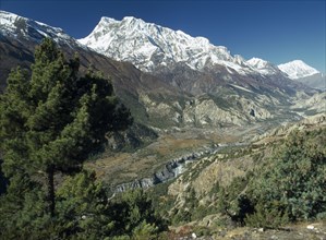 NEPAL, Annapurna Region, Gangapurna Mountain, Snow topped mountain peak above the Marsyangdi River