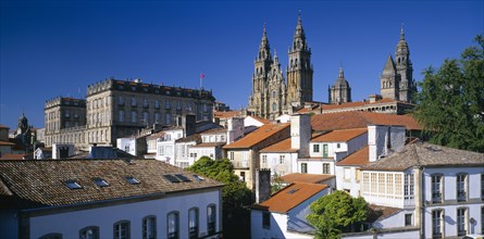 SPAIN, Galicia, Santiago de Compostela, "Cathedral, exterior and spires partly seen above rooftops