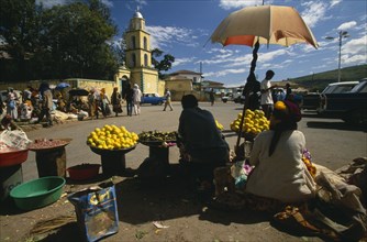 ETHIOPIA, Harerge Province, Harer, The Square.  Market with women selling fruit from stall in the