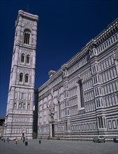 ITALY, Tuscany, Florence, "The Duomo.  Exterior wall and the Campanile, designed by Giotto in 1334