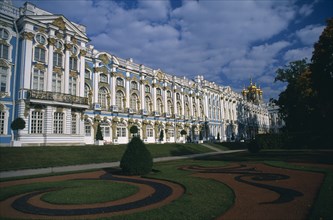 RUSSIA, Pushkin, "Catherine Palace.  View across formal gardens towards blue, white and gold