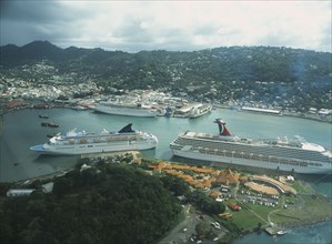 WEST INDIES, St Lucia, Castries, View over town and Port Castries with cruise ships from above.