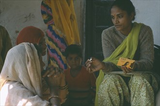 INDIA, Rajasthan, General, Women receiving family planning advice.