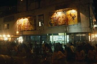 BANGLADESH, Chittagong, "Rickshaw wallahs in front of cinema with posters advertising films above