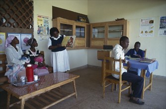 KENYA, Kisii, "Family planning clinic, interior with visitors and staff."