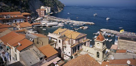 ITALY, Campania, Amalfi Coast, Sorrento.  View over red tiled roof tops and church bell tower