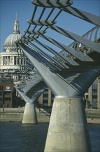 ENGLAND, London, Millennium Bridge. View of section with St Pauls Cathedral in the background.