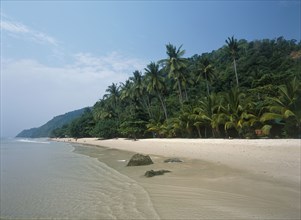 THAILAND, Trat Province, Koh Chang, "White Sand Beach, Haad Sai Khao. View along sandy shore with
