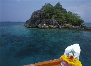 THAILAND, Trat Province, Koh Chang, "Tourists snorkling over coral reefs near Giant Island, Koh