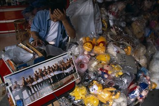 THAILAND, North, Chiang Mai, Chinatown. Shop with plastic wrapped toys for sale and picture