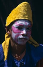 THAILAND, North, Chiang Mai, Chinese New Year.  Young boy wearing costume and face paints during