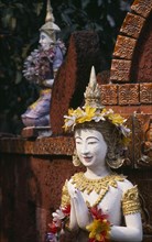 THAILAND, North, Chiang Mai, Wat Bupparam Temple on Tha Phae Road. Detail of brightly coloured