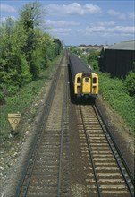 TRANSPORT, Rail, Train, Railway tracks with approaching train.