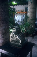 CUBA, Havana, Old manual cash register in courtyard of restaurant