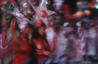 CUBA, Santiago, Carnival dancers blurred movement