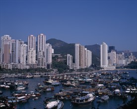 HONG KONG, Aberdeen Typhoon Harbour, View over the busy harbour toward the city skyline beyond