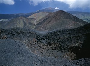 ITALY, Sicily, Mount Etna, Tourists walking around extinct crater