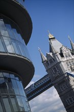 ENGLAND, London, "City Hall, detail of the curved exterior and Tower Bridge in the background"