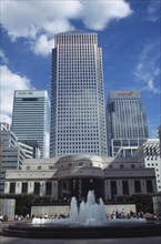 ENGLAND, London, "Canary Wharf, view looking up at the tower and surrounding architecture with
