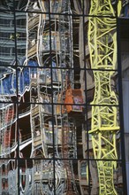 ARCHITECTURE, Detail, Mirror panels of building reflecting scaffold tower and surrounding