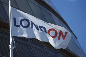 ENGLAND, London, City Hall, White flag with the word London written in red and blue letters flying