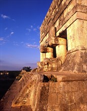 MEXICO, Yucatan, Chichen Itza, Pyramid detail at sunset