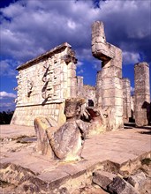 MEXICO, Yucatan, Chichen Itza, Reclining figure in foreground