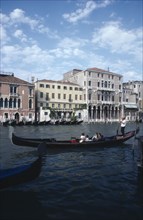 ITALY, Veneto, Venice, Gondola with passengers on the Grand Canal
