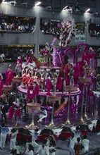 BRAZIL, Rio de Janeiro, Carnival float carrying dancers dressed in glittering costumes