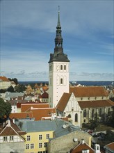 ESTONIA, Tallinn, View over fooftops towards the spire of Niguliste kirik or Saint Nicholas Church