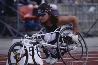 20025671 SPORT Athletics Track Disabled female wheelchair athlete on the start line