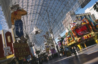 USA, Nevada, Las Vegas, Pioneer casino’s famous cowboy sign in Fremont street covered downtown area